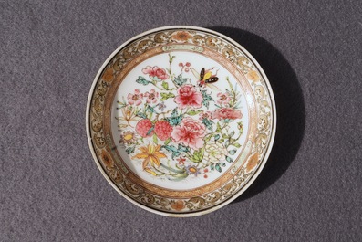 A fine Chinese famille rose cup and saucer with floral design, Yongzheng